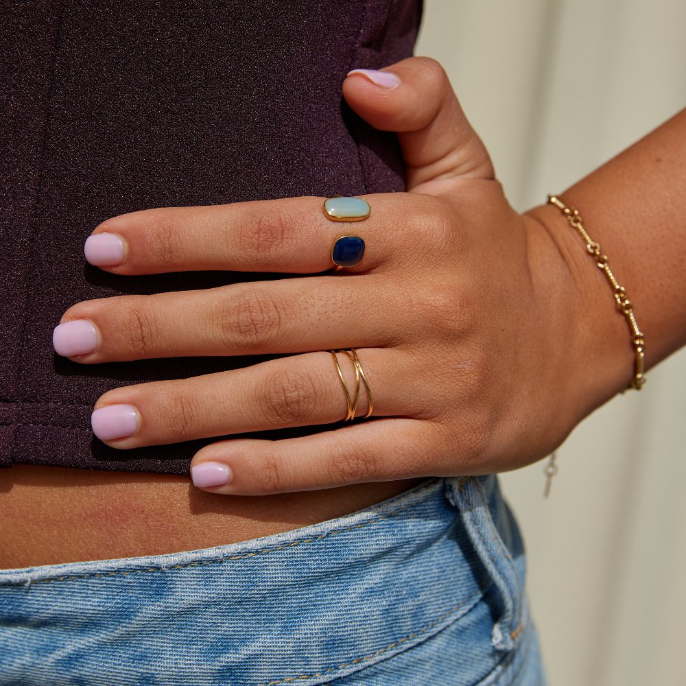 Elegant silver wrap ring with subtle shadow details