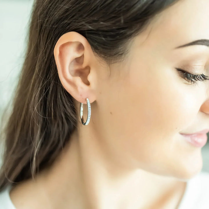 Elegant white gold earrings with subtle cubic zirconia details