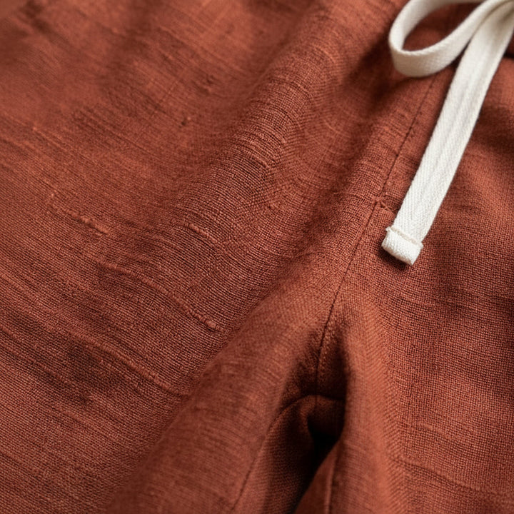https://cdn.shopify.com/s/files/1/0959/2776/3327/files/breezy-relaxed-fit-straight-pants-15.jpg?v=1776074552