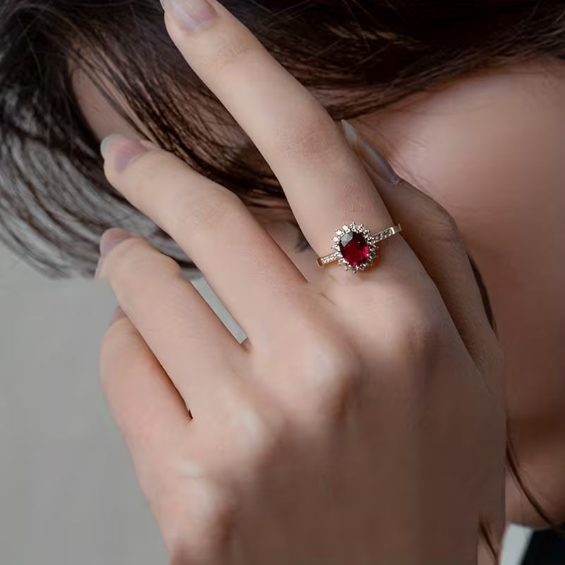 Elegant gold ring with red cubic zirconia