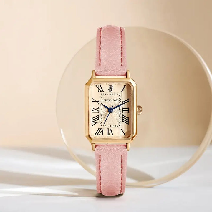 Elegant gold watch with a refined little stone