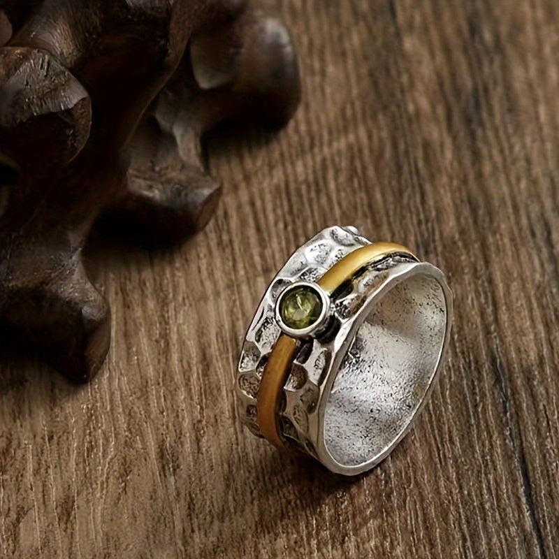Refined ring with green cubic zirconia
