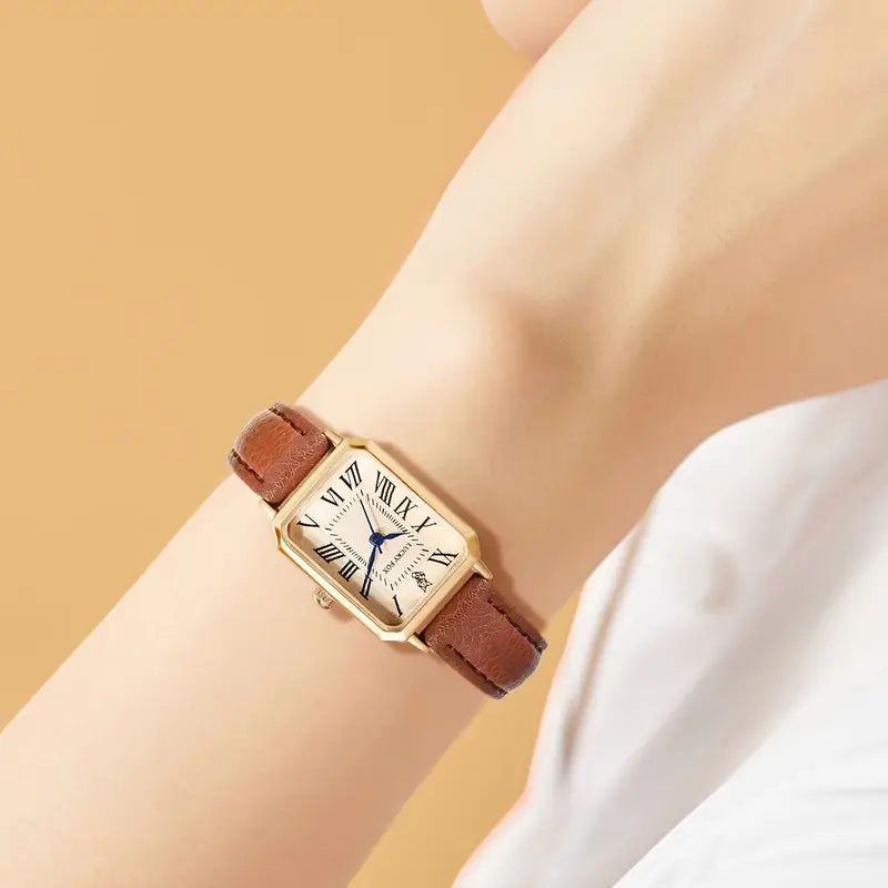 Elegant gold watch with a refined little stone