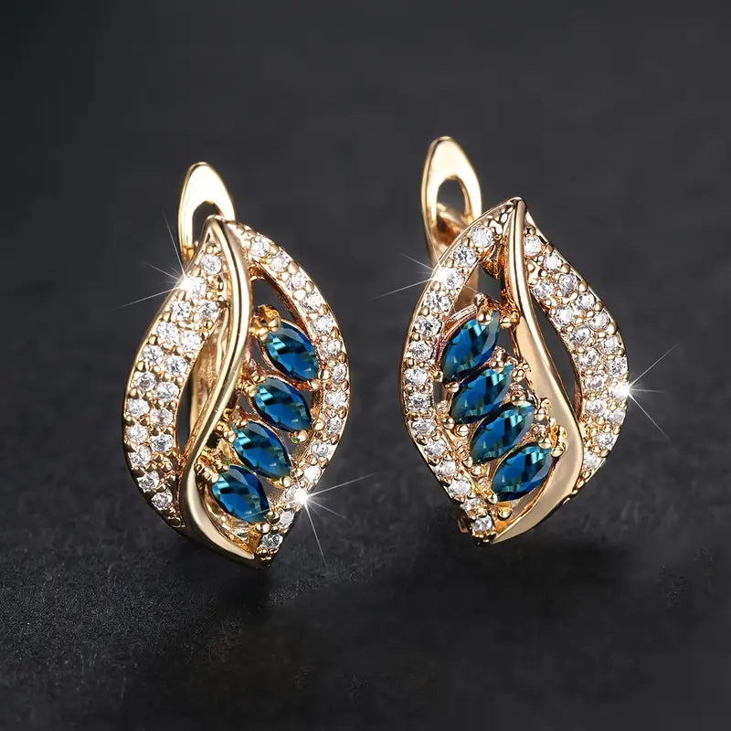Ethereal gold earrings with delicate cubic zirconia