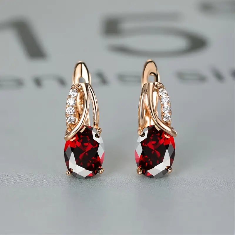 Elegant gold earrings with cubic zirconia stones