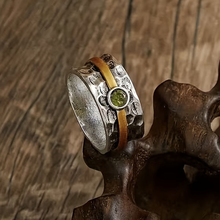 Refined ring with green cubic zirconia