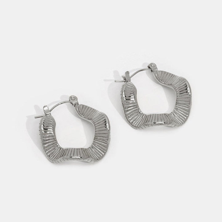 Elegant silver hoops with subtle waves