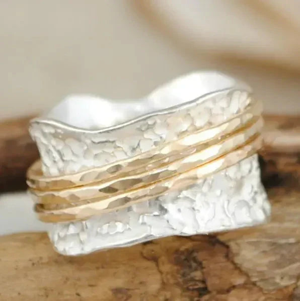 Elegant thin gold and silver ring with refined design