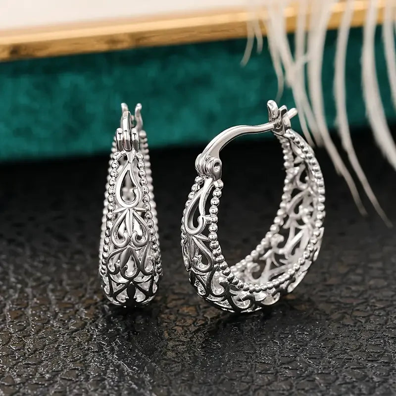 Elegant white gold earrings with a refined shape