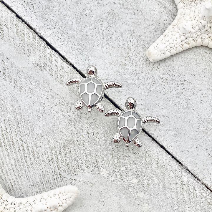 Silver earrings with opal in sea turtle design