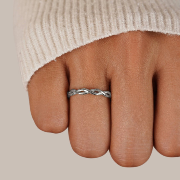 Elegant silver twist ring with subtle shine