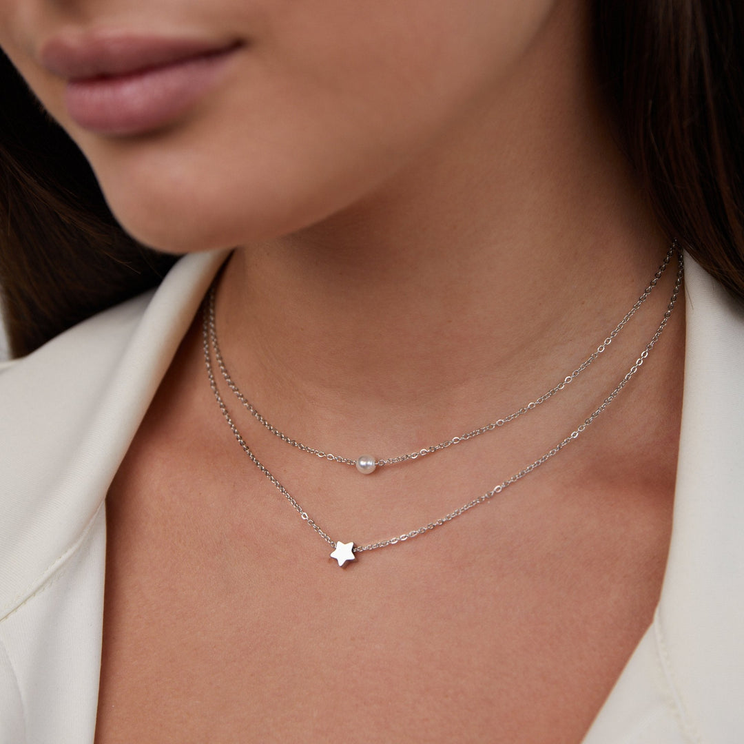 Refined silver necklace with stars and pearls