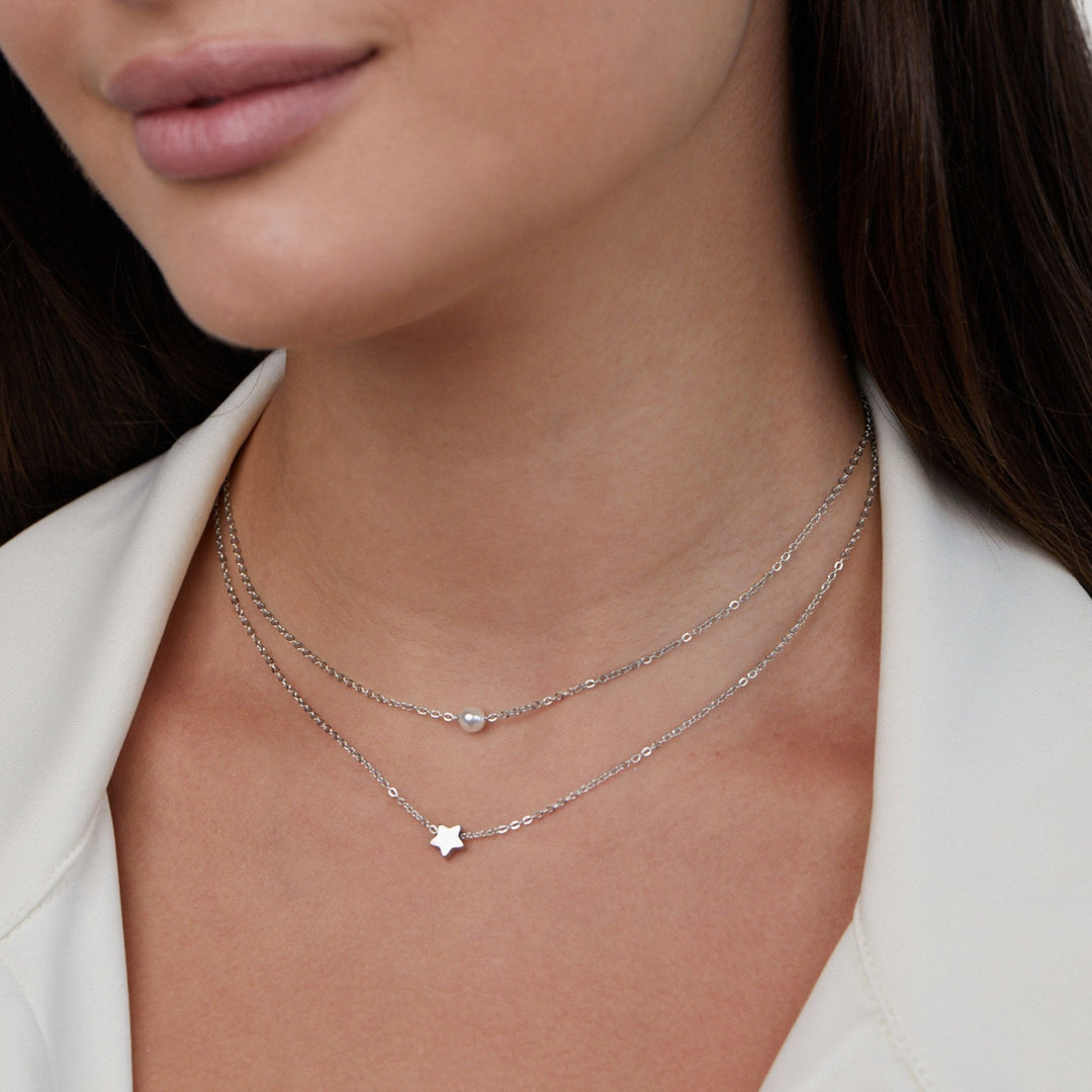 Refined silver necklace with stars and pearls
