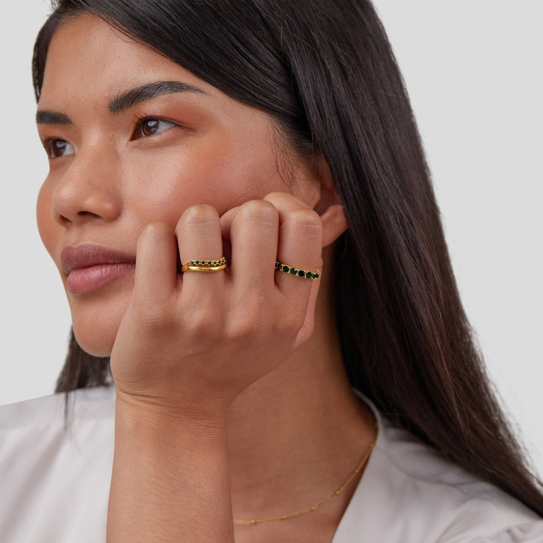 Layered ring in emerald green with refined finish