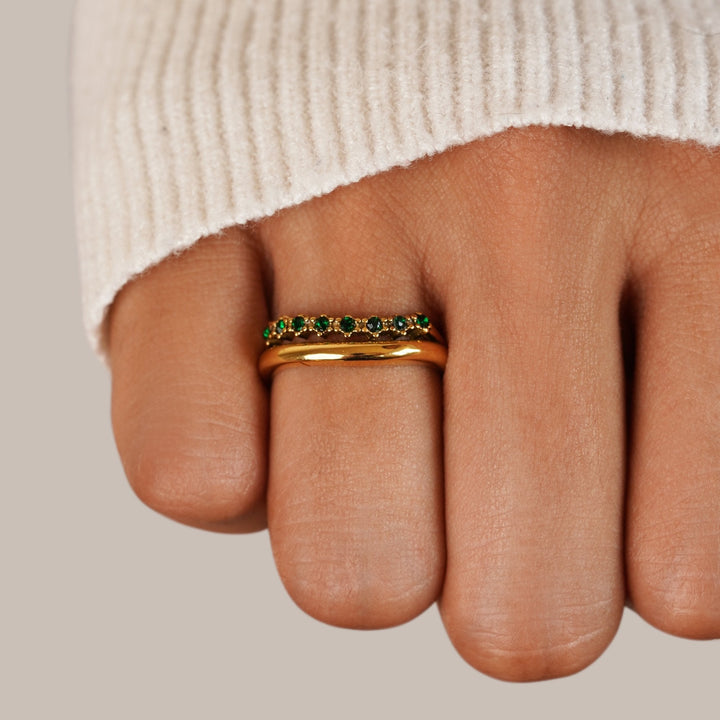 Layered ring in emerald green with refined finish
