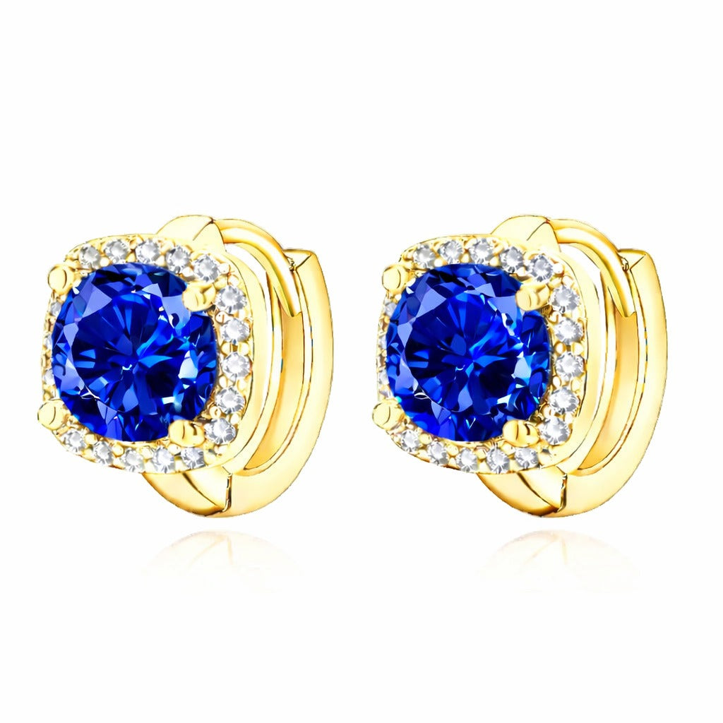 Soft gold earrings with sapphire detail