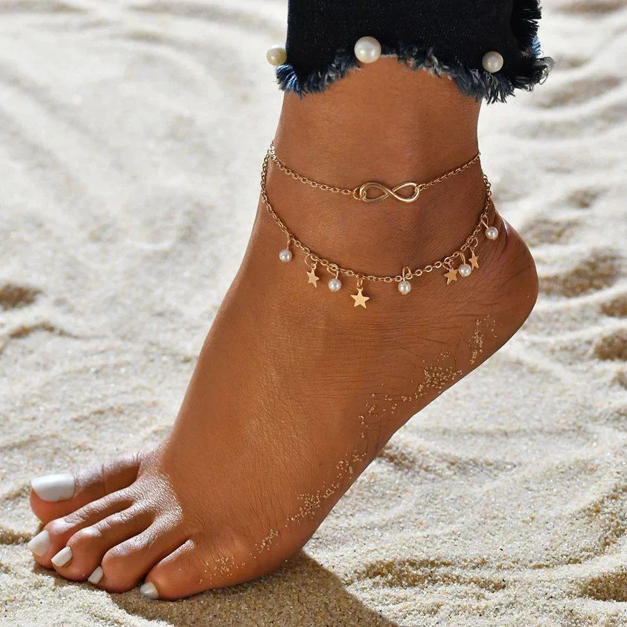 Elegant gold anklet with pearls and stars