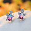 Elegant silver earrings with cubic zirconia and seaweed design