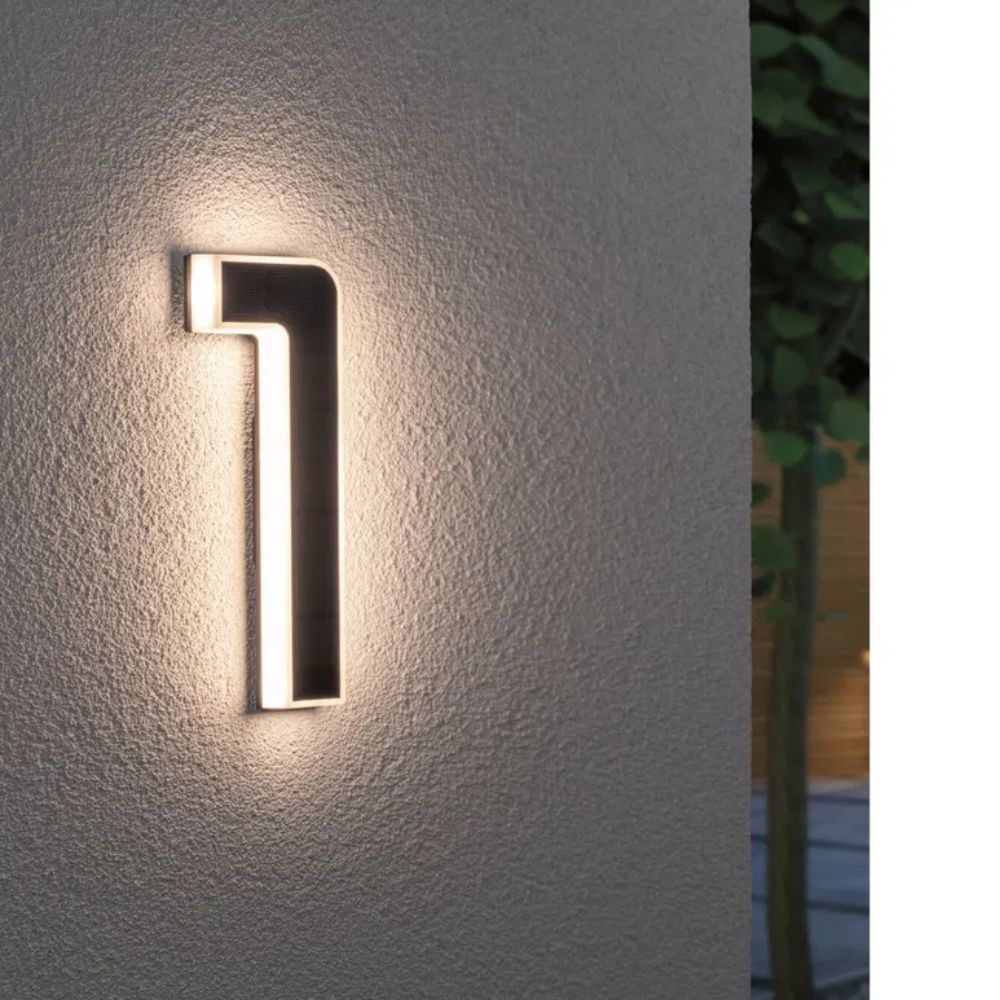 Solar-lit house number with LED and dusk sensor