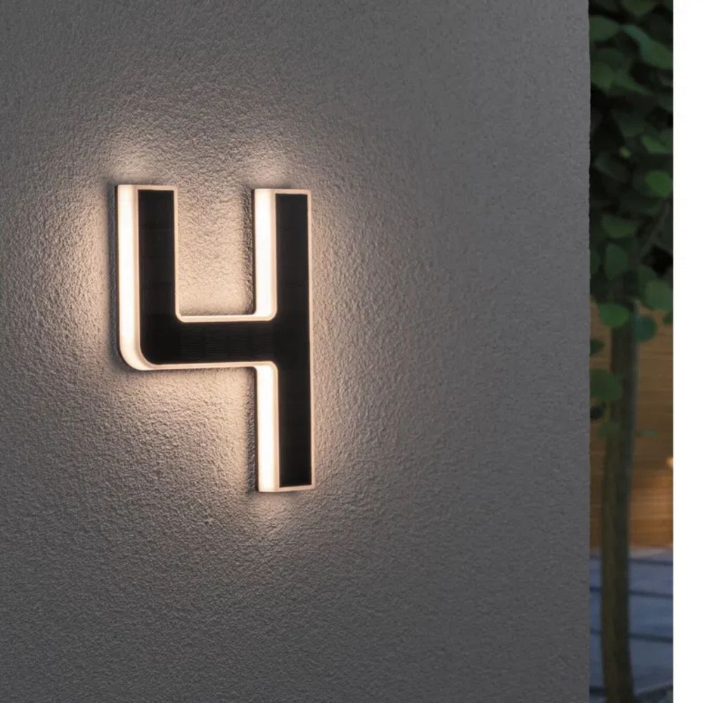 Solar-lit house number with LED and dusk sensor