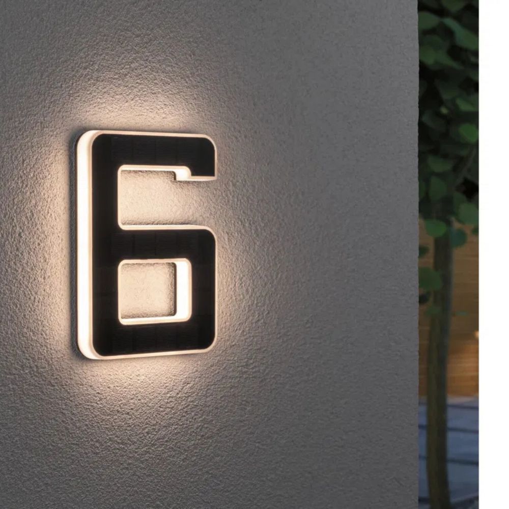 Solar-lit house number with LED and dusk sensor