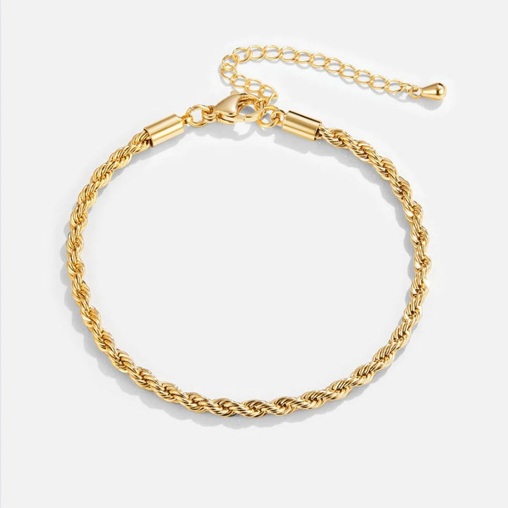 Elegant gold bracelet with refined twist