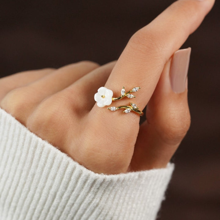 Soft white cubic zirconia flower ring